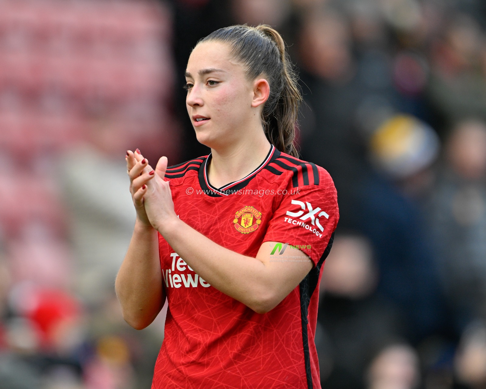 Maya Le Tissier of Manchester United Women claps fans at full time, during the Vitality Women's FA Cup match Manchester United Women vs Newcastle United women at Leigh Sports Village, Leigh, United Kingdom, 14th January 2024

(Photo by Cody Froggatt/News Images)