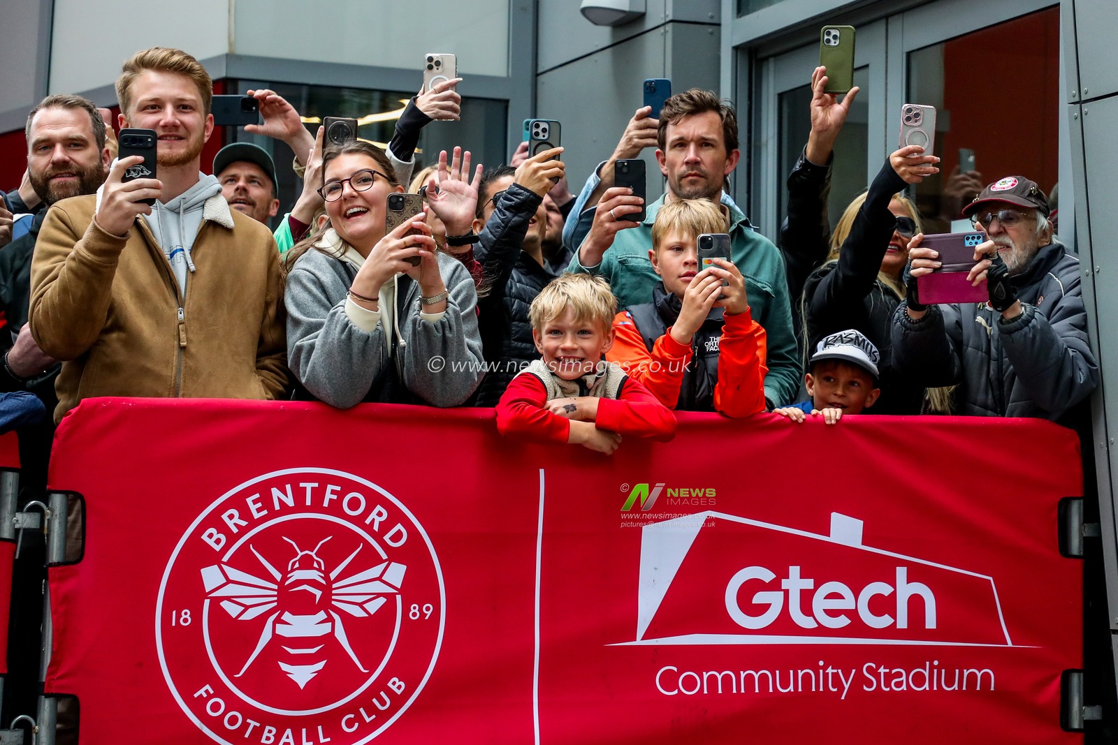 Fans wait for player arrivals prior to the Premier League match Brentford vs Manchester United at The Gtech Community Stadium, London, United Kingdom, 4th May 2025

(Photo by Izzy Poles/News Images)