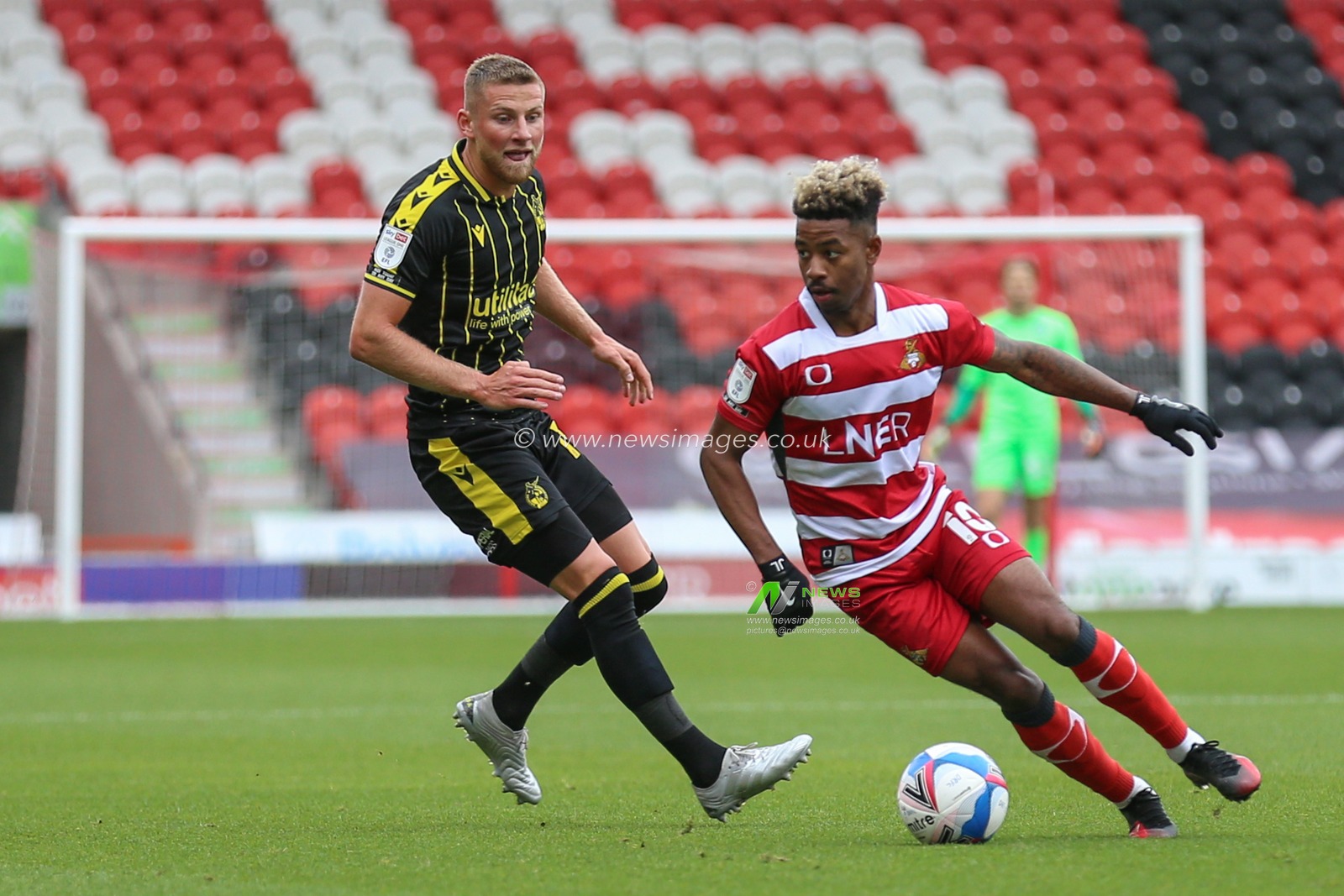 Jason Lokilo (10) of Doncaster Rovers in action