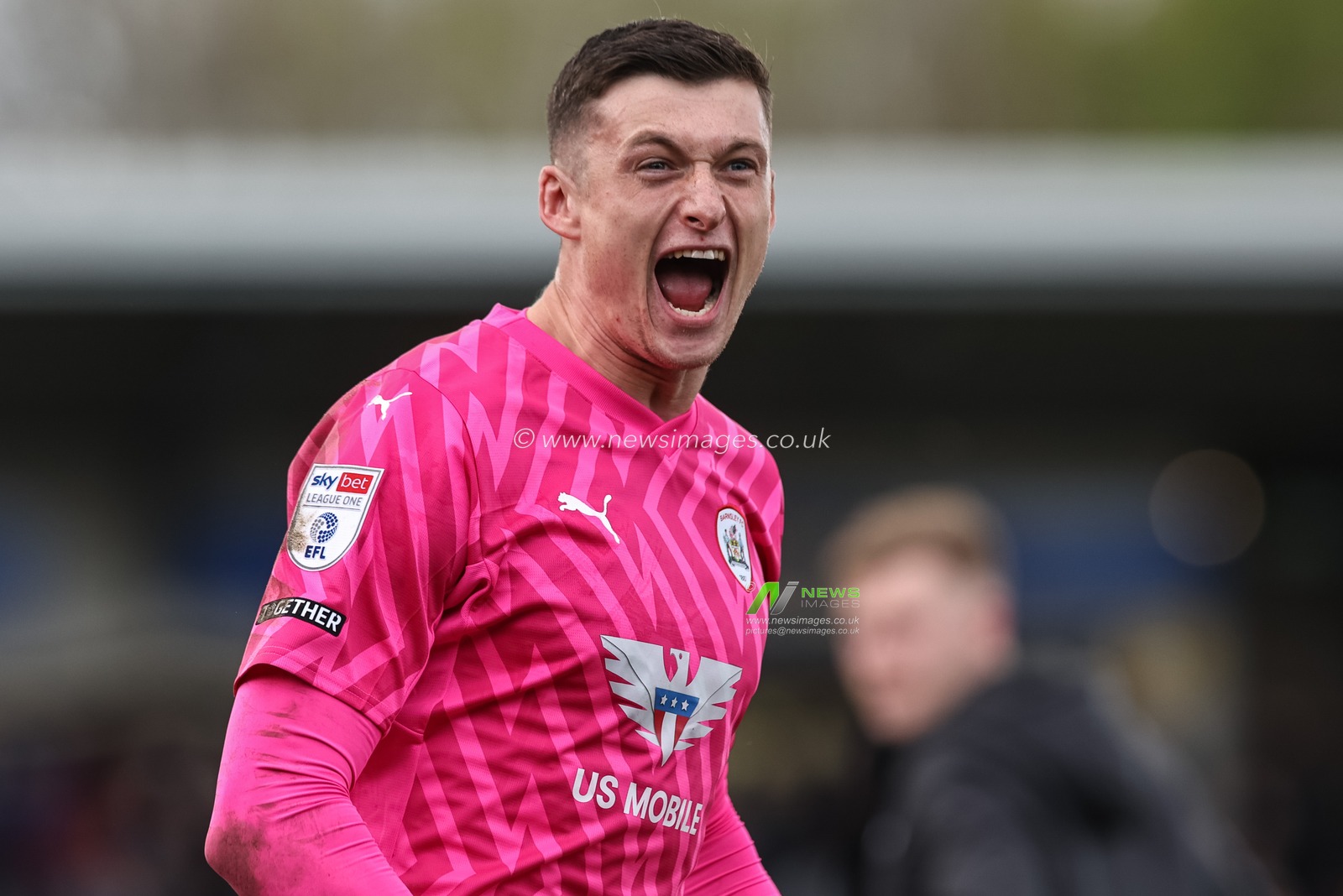 Liam Roberts of Barnsley celebrates the 1-3 win with the traveling fans during the Sky Bet League 1 match Burton Albion vs Barnsley at Pirelli Stadium, Burton upon Trent, United Kingdom, 1st April 2024

(Photo by Mark Cosgrove/News Images)