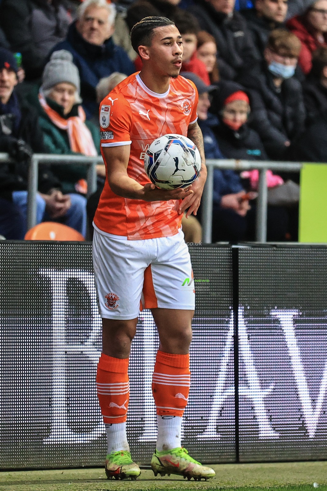 Jordan Lawrence-Gabriel #4 of Blackpool takes a throw-in