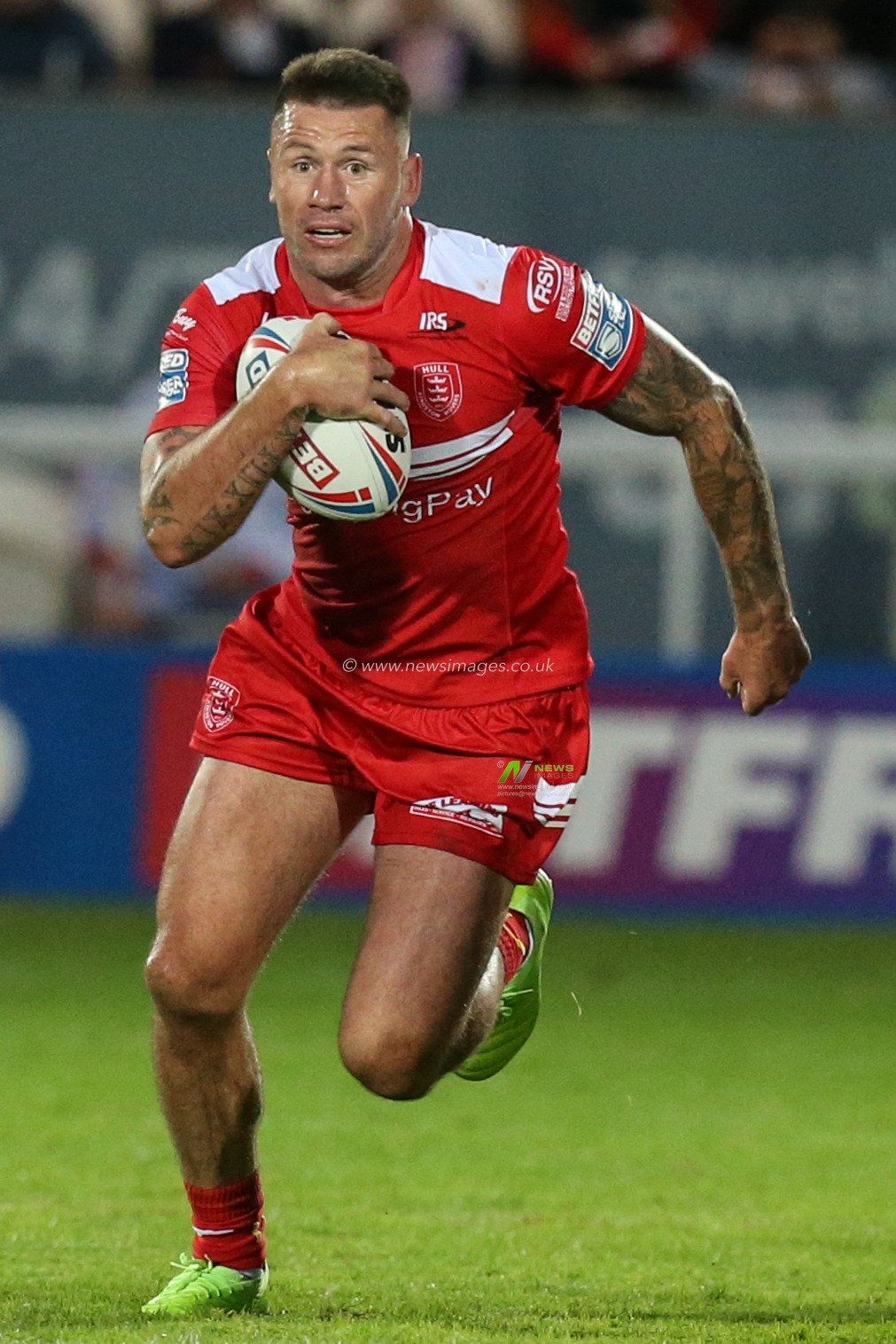 Shaun Kenny-Dowall (4) of Hull KR runs with the ball