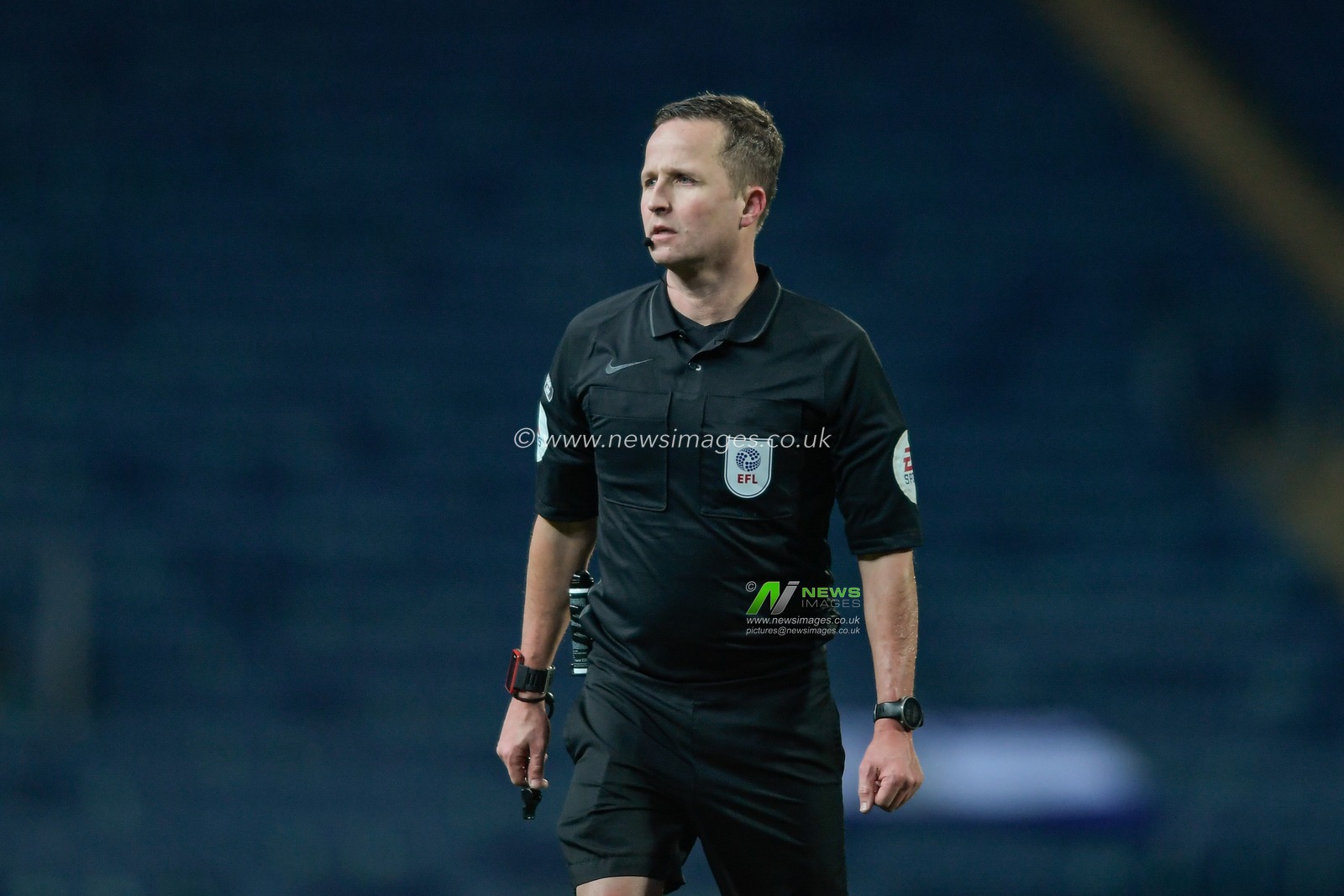 Referee David Webb in action during the game