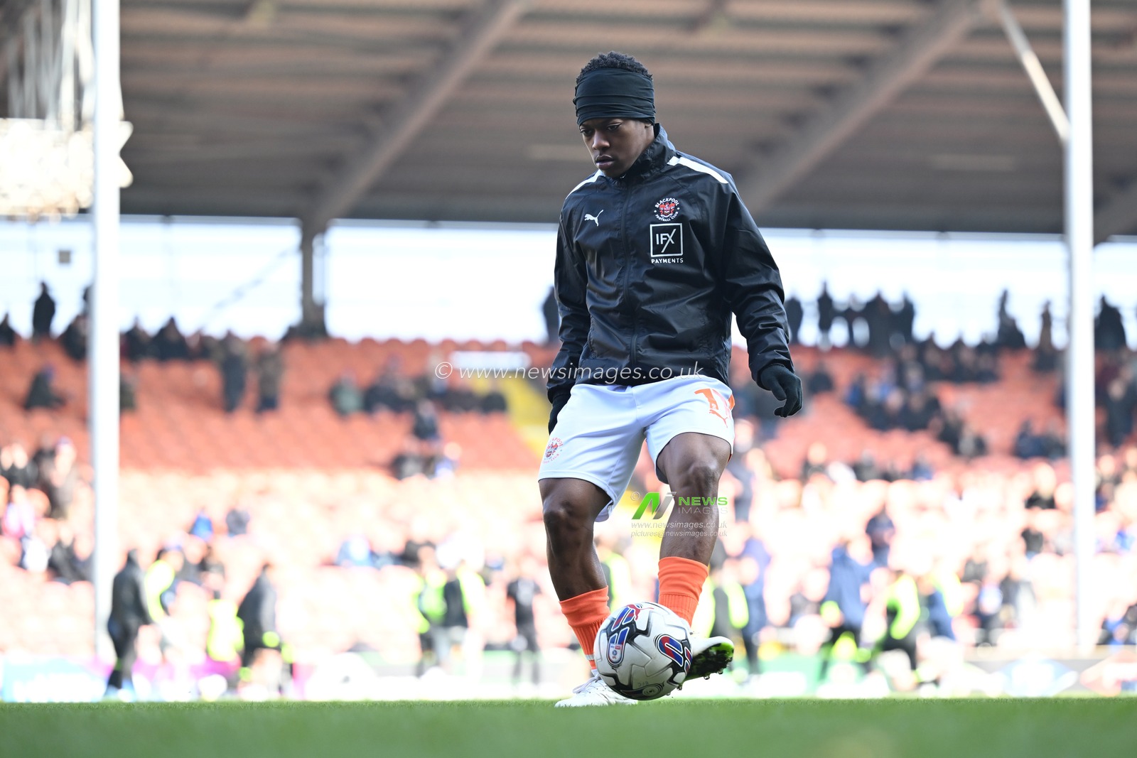 Karamoko Dembele of Blackpool during the pre match warm up for  the Sky Bet League 1 match Blackpool vs Portsmouth at Bloomfield Road, Blackpool, United Kingdom, 9th March 2024

(Photo by Ashley Crowden/News Images)