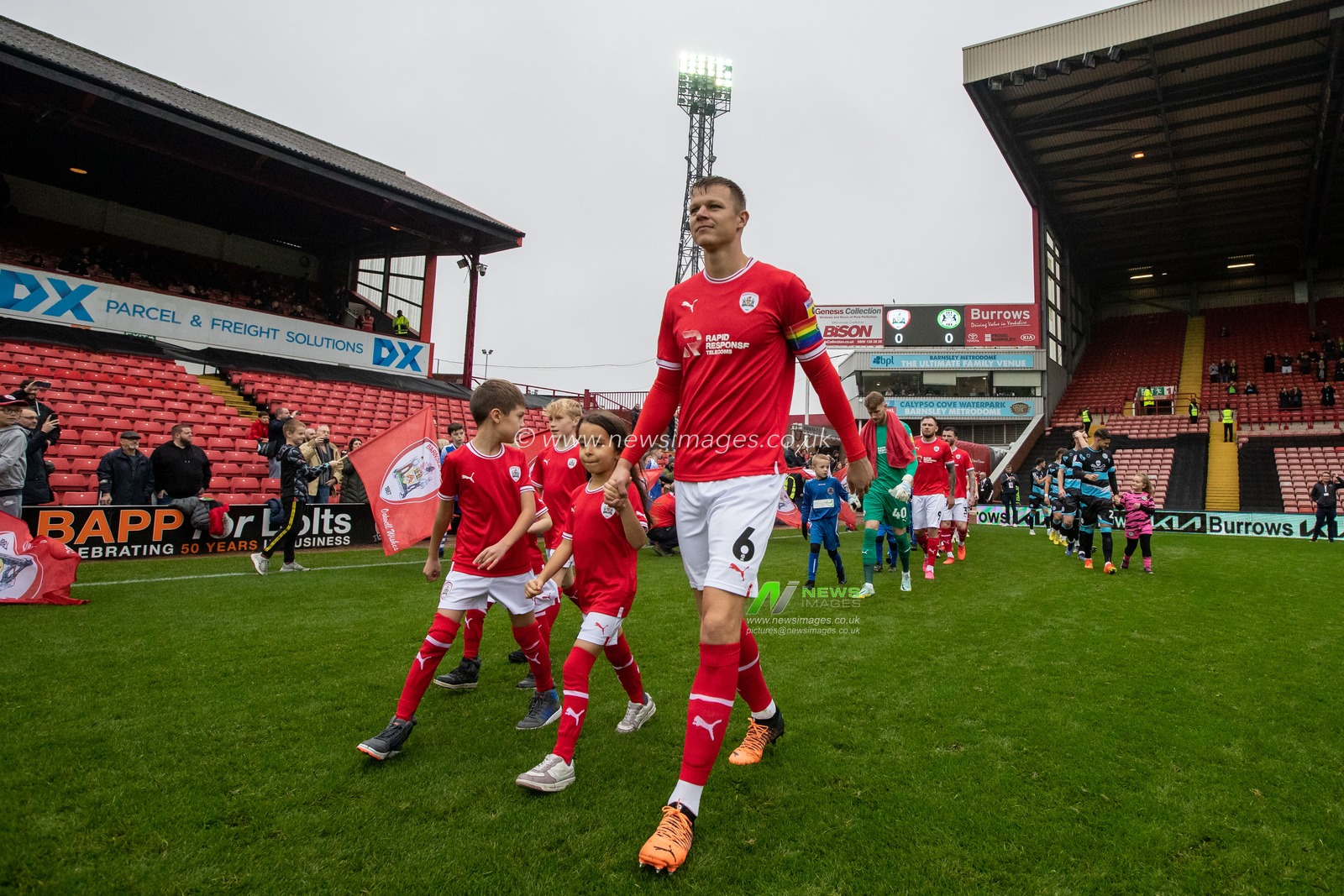 Mads Juel Andersen #6 of Barnsley leads his team out for the Sky Bet League 1 match Barnsley vs Forest Green Rovers at Oakwell, Barnsley, United Kingdom, 29th October 2022

(Photo by James Heaton/News Images)