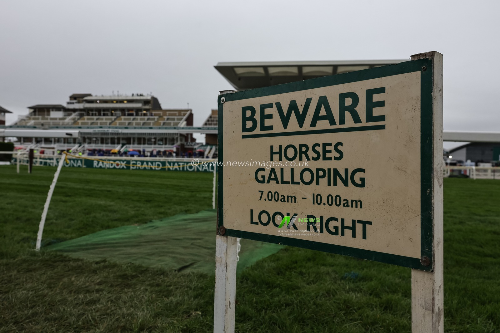 A beware of horses galloping sign as the side of the racecourse during the 2026 Randox Grand National Opening Day at Aintree Racecourse, Aintree, United Kingdom on 09 April 2026

(Photo by Mark Cosgrove/News Images)