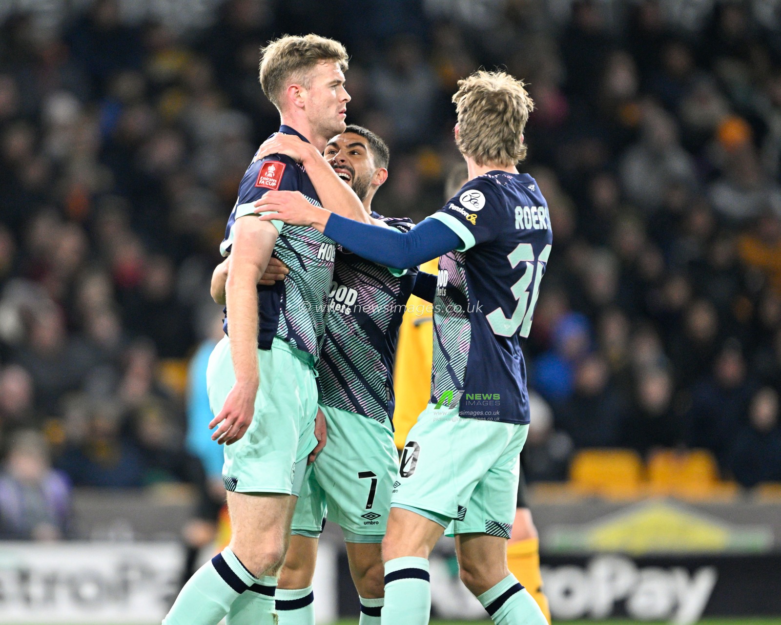 Nathan Collins of Brentford celebrates his goal and the opening goal of the match to make it 0-1 Brentford, during the Emirates FA Cup Third Round Replay match Wolverhampton Wanderers vs Brentford at Molineux, Wolverhampton, United Kingdom, 16th January 2024

(Photo by Cody Froggatt/News Images)