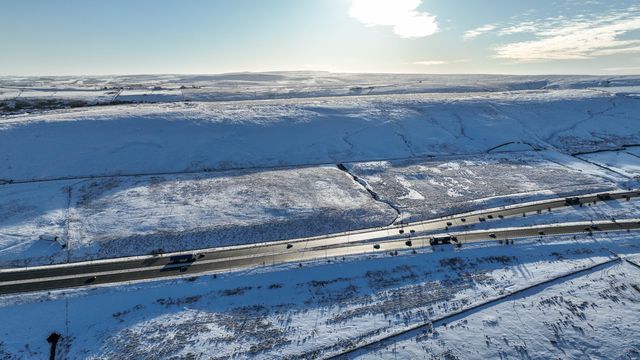 Heavy Snow over the hills of Scammonden Bridge and Booth Wood Reservoir areas of West Yorkshire and a free running M62 where the farm house sits in the middle of the motorway, Kirklees, United Kingdom, 11th January 2025

(Photo by Mark Cosgrove/News Images)