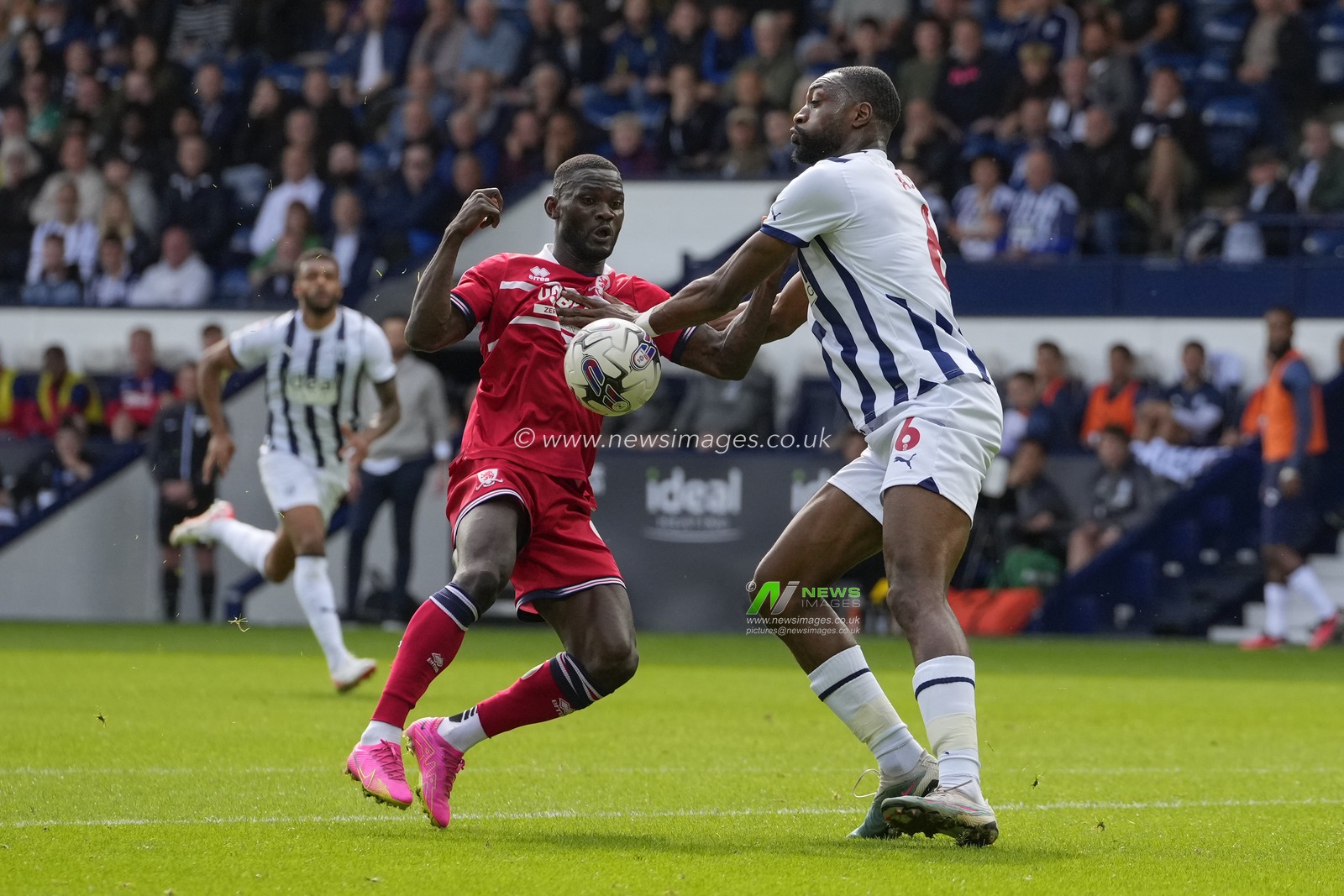 Emmanuel Latte Lath #9 of Middlesbrough competes for the ball with Semi Ajayi #6 of West Bromwich Albion during the Sky Bet Championship match West Bromwich Albion vs Middlesbrough at The Hawthorns, West Bromwich, United Kingdom, 26th August 2023

(Photo by Steve Flynn/News Images)