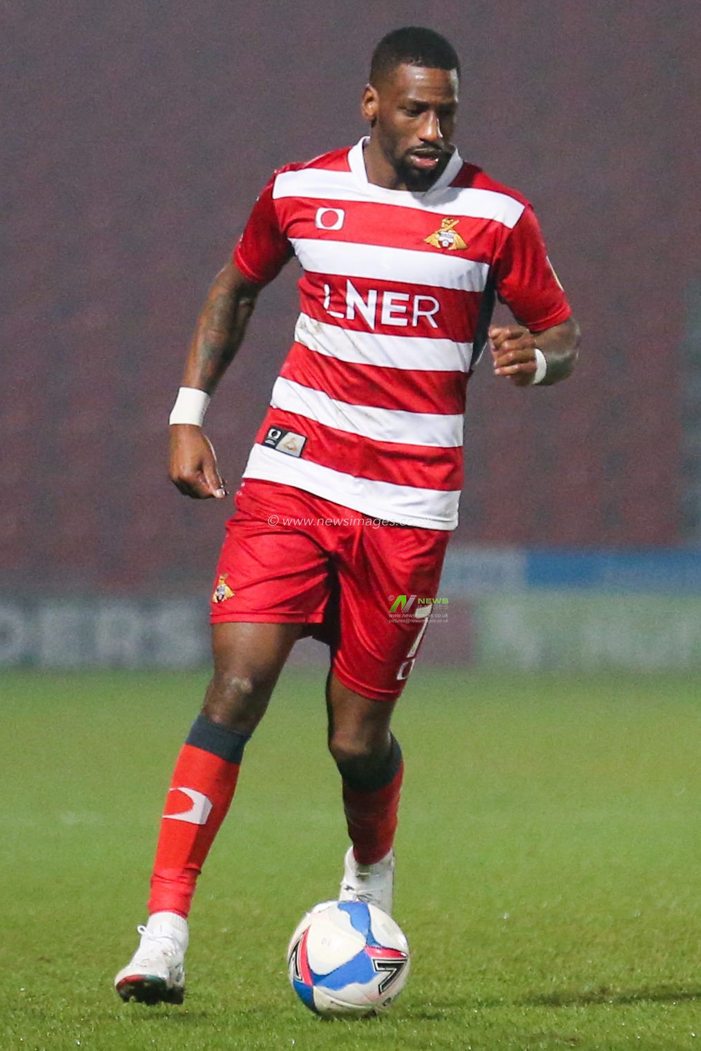 Omar Bogle #7 of Doncaster Rovers in action during the game