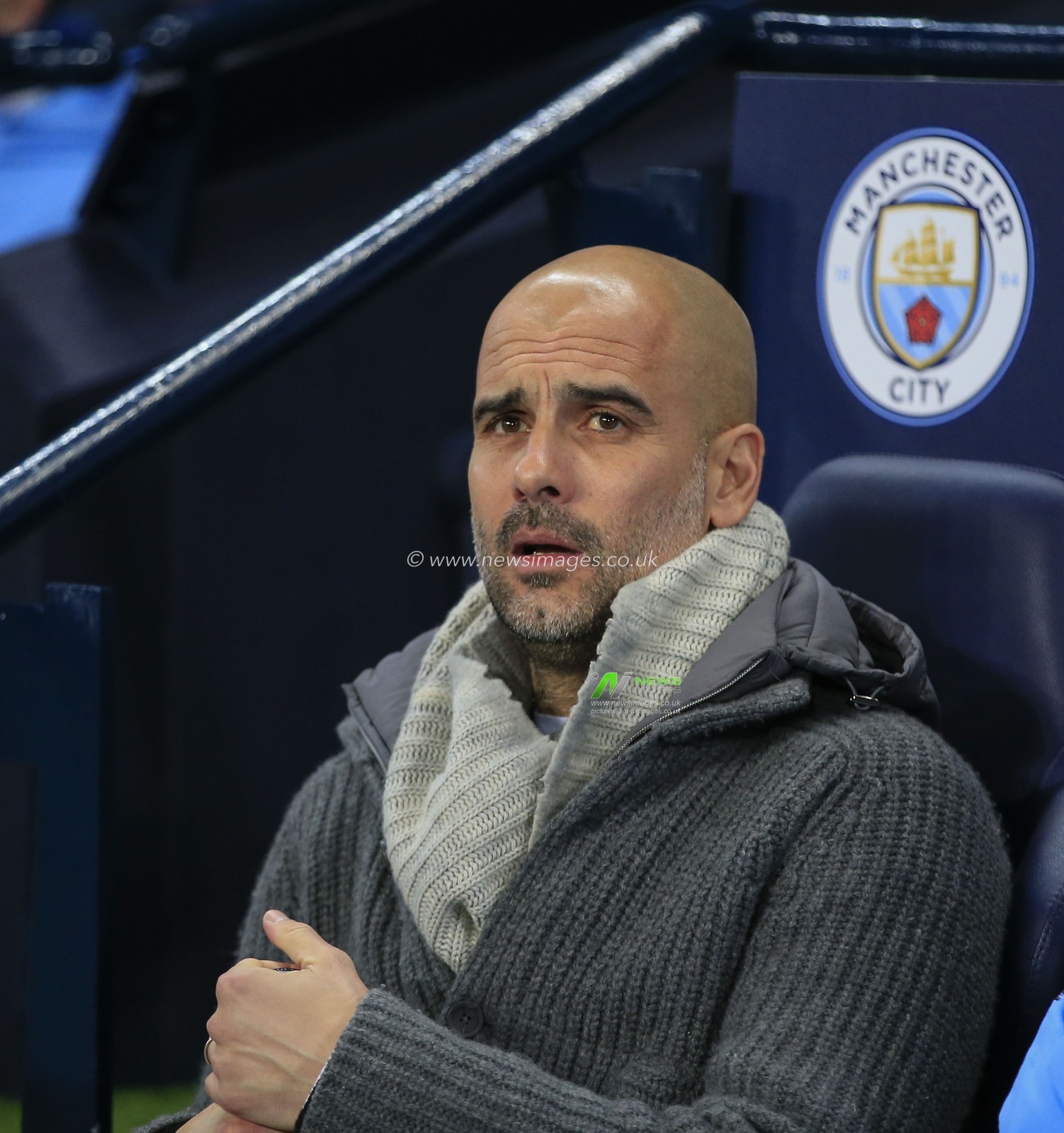 12th March 2019 , Etihad Stadium, Manchester, England; UEFA Champions League, Round of 16, Manchester City v Schalke ; Manchester City manager Pep Guardiola settles down for the game

Credit: Conor Molloy/News Images