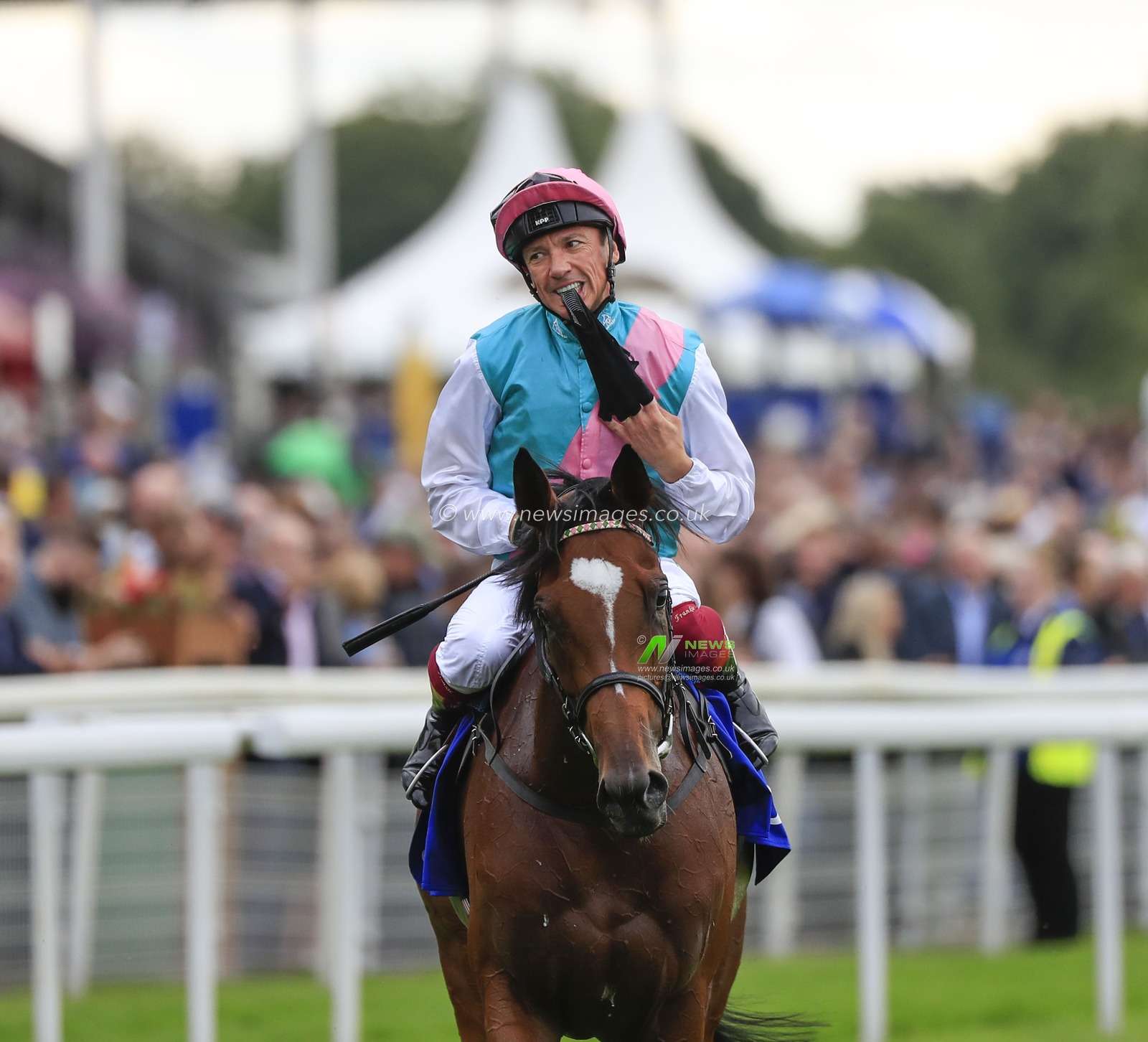 22nd August 2019 , York Racecourse, York, Great Britain; 2019 Darley Yorkshire Oaks/Ladies Day ; Frankie Dettori removes his riding gloves after winning The Darley Yorkshire Oaks on Enable

Credit Conor Molloy/News Images
