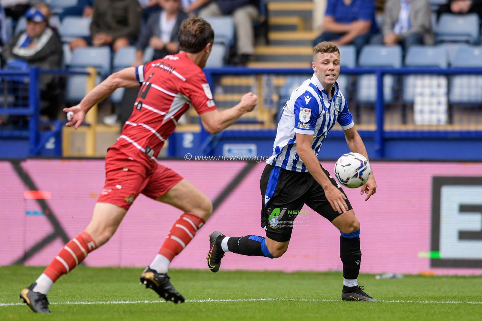 Florian Kamberi #20 of Sheffield Wednesday starts an attacking move