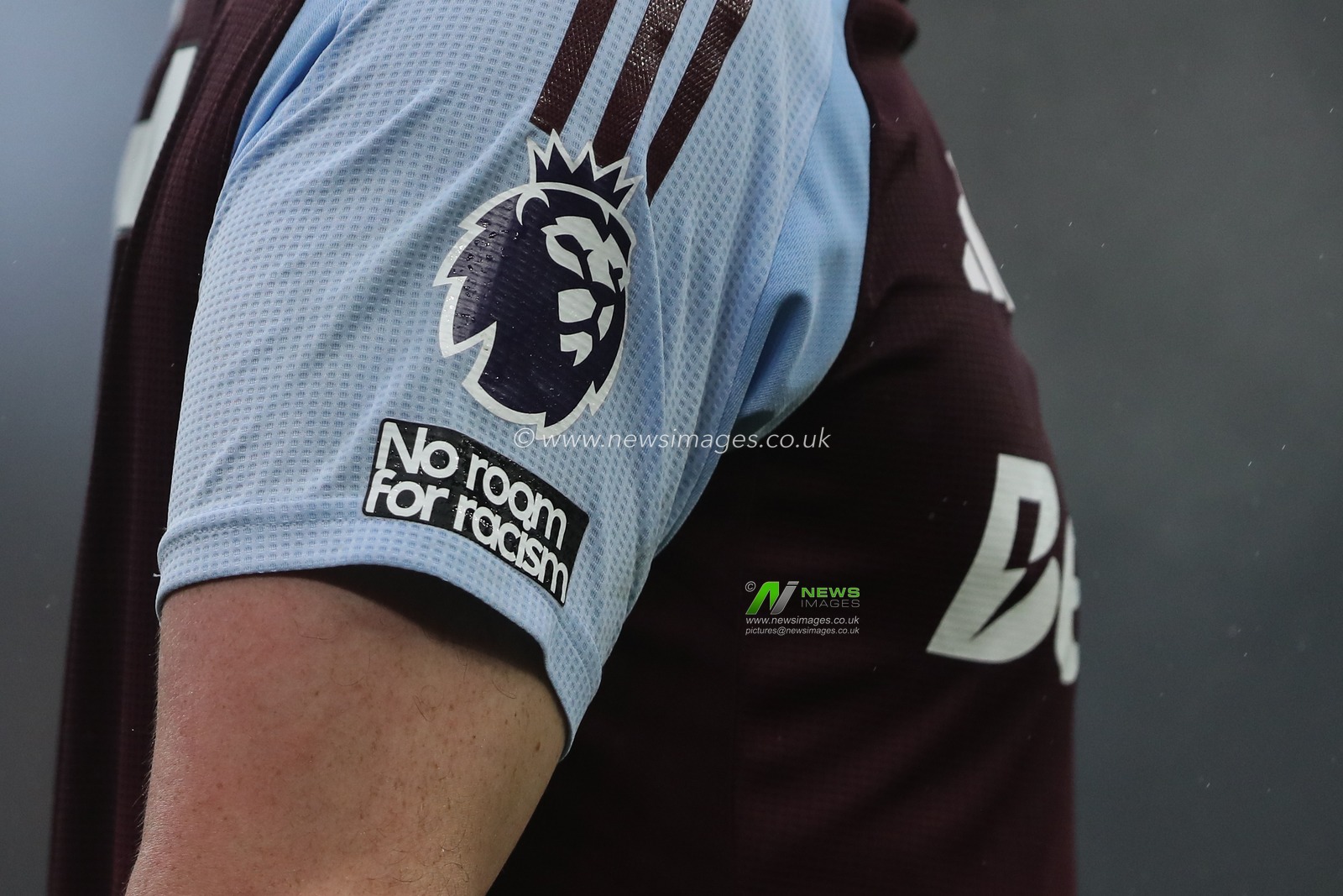 The Premier League and No Room for Racism badge on the home shirt of JohnÂ McGinn of Aston Villa during the Premier League match Aston Villa vs Ipswich Town at Villa Park, Birmingham, United Kingdom, 15th February 2025

(Photo by Gareth Evans/News Images)