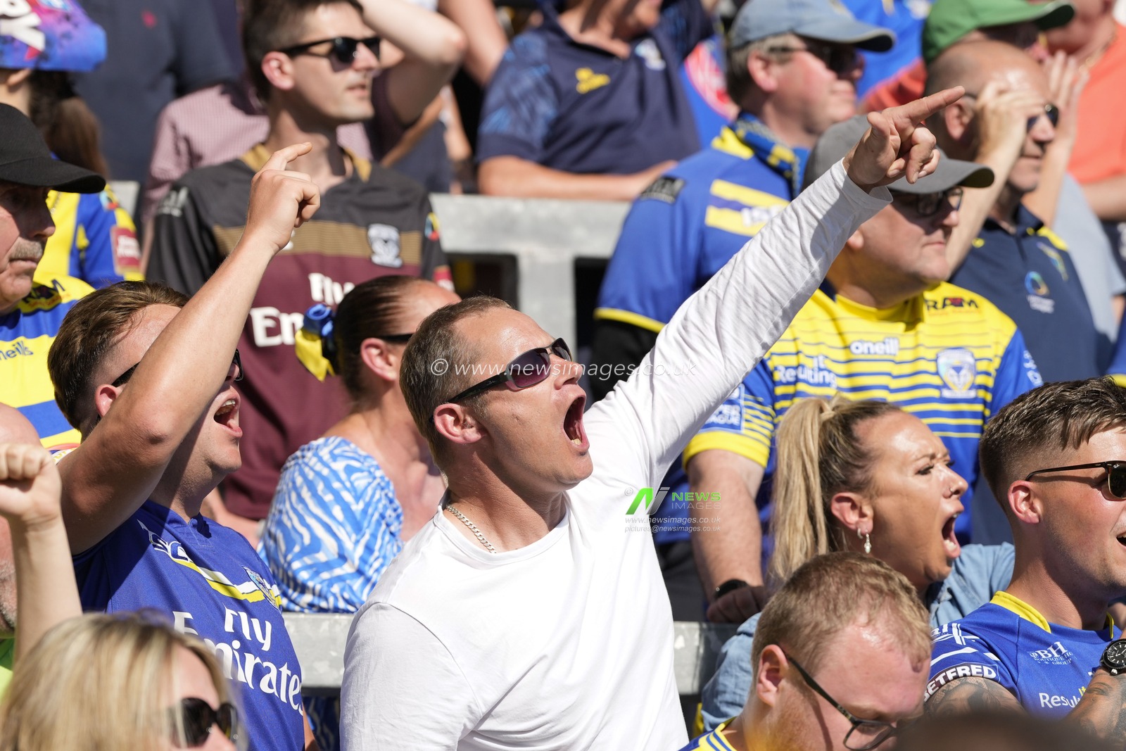 Warrington Wolves fans cheer on their side during the Betfred Challenge Cup Semi-Final match Huddersfield Giants vs Warrington Wolves at Totally Wicked Stadium, St Helens, United Kingdom, 19th May 2024

(Photo by Steve Flynn/News Images)
