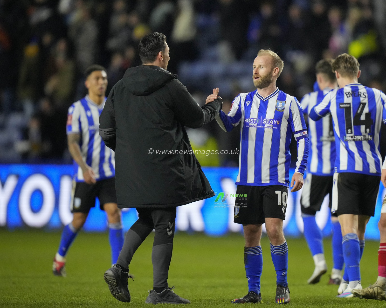 Scott Brown manager of Fleetwood Town greets Barry Bannan #10 of Sheffield Wednesday after the Emirates FA Cup Fourth Round match Sheffield Wednesday vs Fleetwood Town at Hillsborough, Sheffield, United Kingdom, 28th January 2023

(Photo by Steve Flynn/News Images)