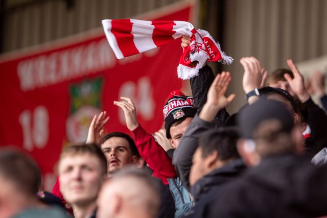 Wrexham fans during the Sky Bet League 1 match Wrexham vs Stockport County at SToK Cae Ras, Wrexham, United Kingdom, 22nd March 2025

(Photo by Nik Mesney/News Images)
