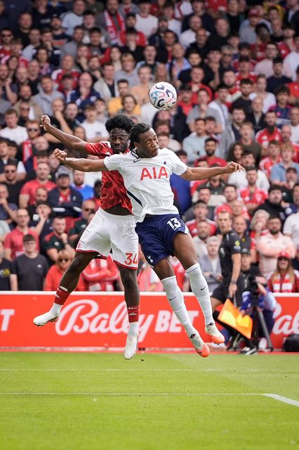 Ola Aina of Nottingham Forest battles for the ball  with Destiny Udogie of Tottenham Hotspur during the Premier League match Nottingham Forest vs Tottenham Hotspur at City Ground, Nottingham, United Kingdom on 05 September 2026

(Photo by Maynard Manyowa/News Images)