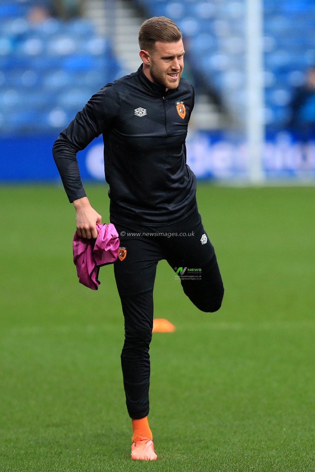 Callum Elder #3 of Hull City stretching.