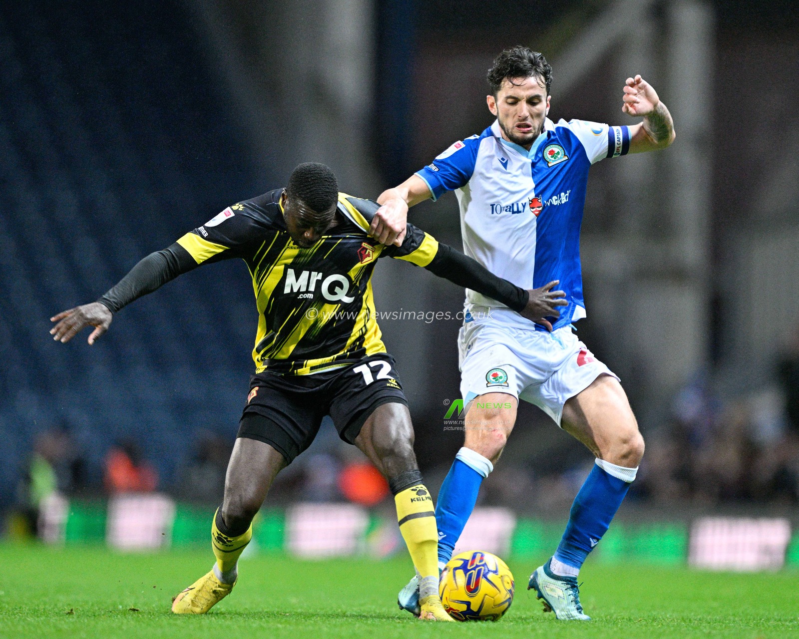 Ken Sema 12# of Watford Football Club and Lewis Travis #27 of Blackburn Rovers battle for the ball, during the Sky Bet Championship match Blackburn Rovers vs Watford at Ewood Park, Blackburn, United Kingdom, 23rd December 2023

(Photo by Cody Froggatt/News Images)