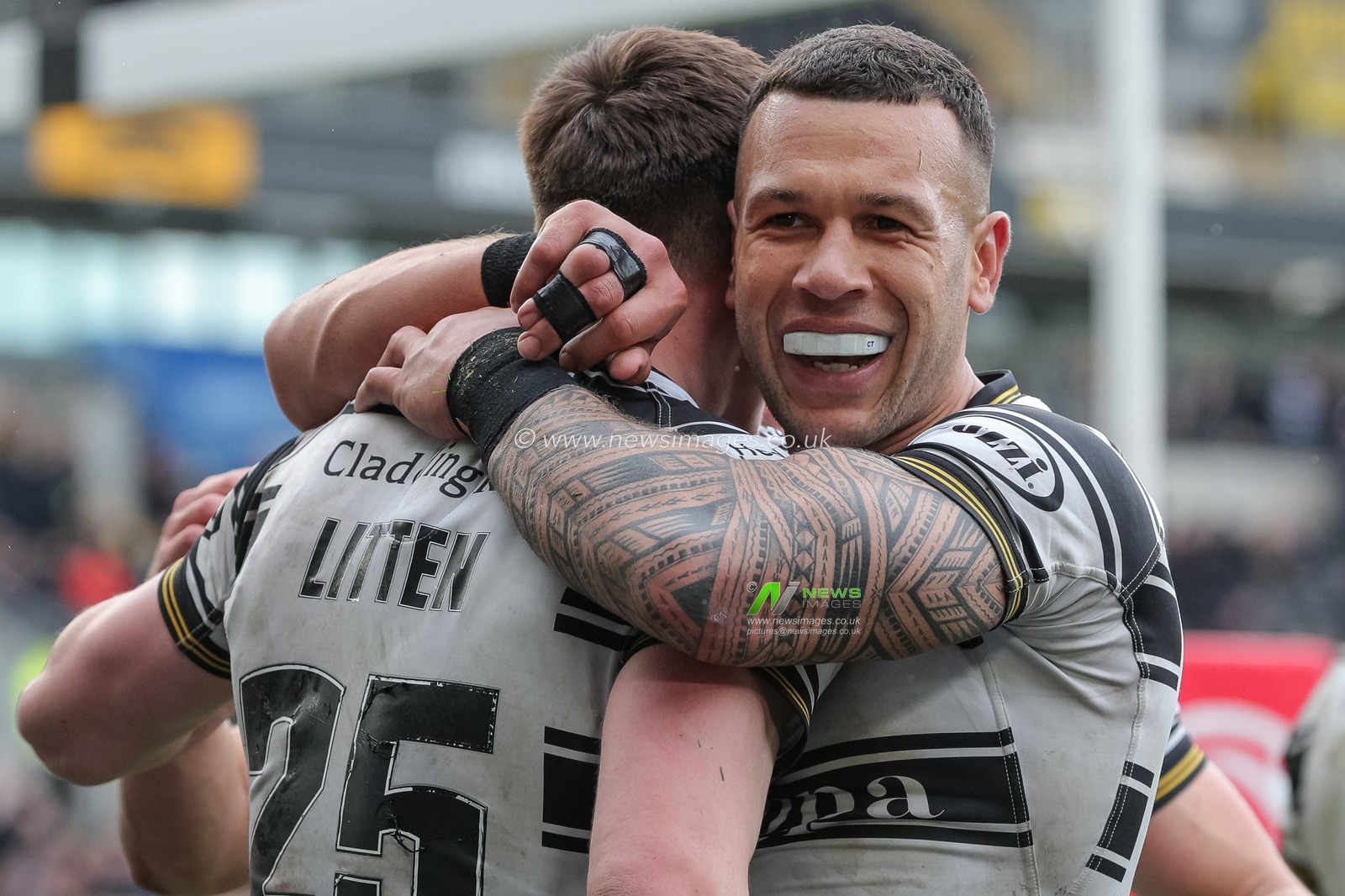 Carlos Tuimavave #3 of Hull FC hugs Davy Litten #25 of Hull FC during the Betfred Super League Round 10 match Hull FC vs Huddersfield Giants at MKM Stadium, Hull, United Kingdom, 23rd April 2023

(Photo by James Heaton/News Images)