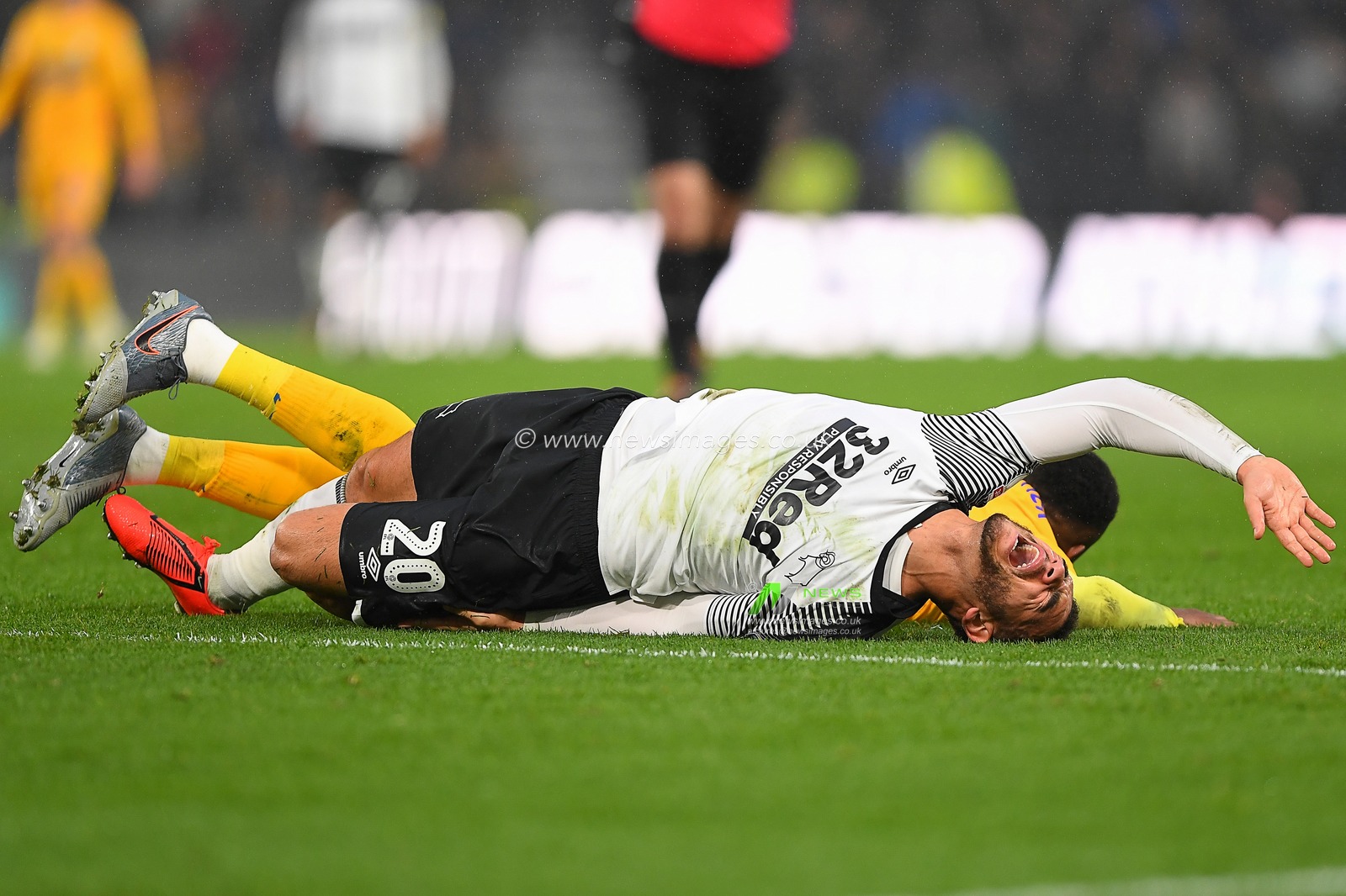 23rd November 2019, Pride Park Stadium, Derby, England; Sky Bet Championship, Derby County v Preston North End : Mason Bennett (20) of Derby County screams in agony after being fouled by Darnell Fisher (2) of Preston North End 

Credit: Jon Hobley/News Images