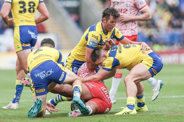 Fanitesi Niu of Leigh Leopards is tackled by Josh Thewlis Stefan Ratchford and Danny Walker of Warrington Wolves during the Betfred Super League Round 25 match Warrington Wolves vs Leigh Leopards at Halliwell Jones Stadium, Warrington, United Kingdom, 6th September 2025

(Photo by Mark Cosgrove/News Images)