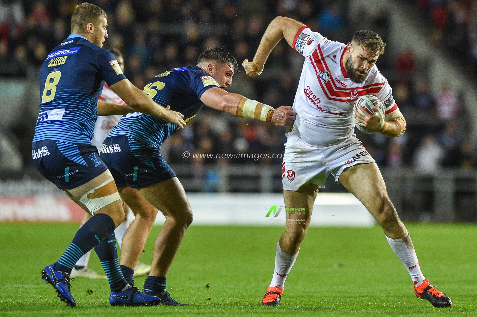 27th September 2019, Tottally Wicked Stadium, St Helens, England; Betfred Super League Semi Final, Saint Helens v Wigan Warriors :Saint Helens Alex Walmsley tear through the Wigan Warriors defence.

Credit: Dean Williams/News Images