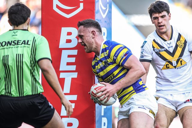 Ben Currie of Warrington Wolves goes over for a try during the Betfred Super League round 5 match Warrington Wolves vs Castleford Tigers at The Halliwell Jones Stadium, Warrington, United Kingdom on 21 March 2026

(Photo by Alfie Cosgrove/News Images)