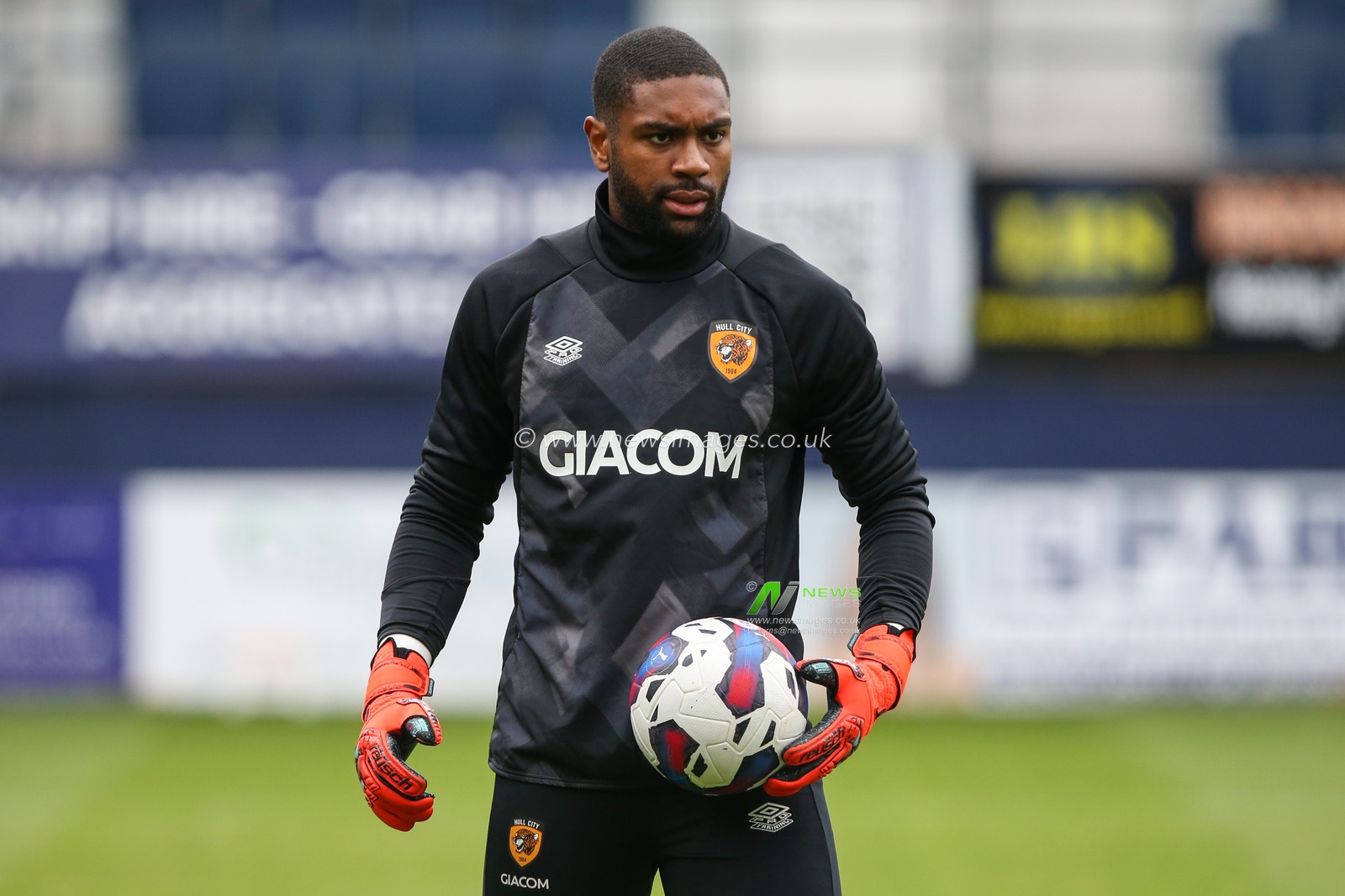 ThimothÃ©e Lo-Tutala #32 of Hull City warms up during the Sky Bet Championship match Luton Town vs Hull City at Kenilworth Road, Luton, United Kingdom, 8th May 2023

(Photo by Arron Gent/News Images)