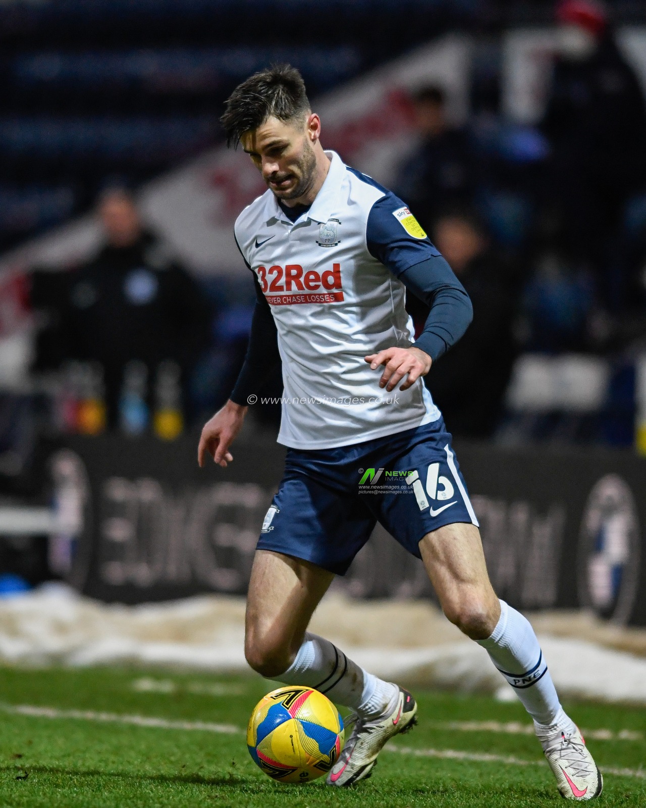 Andrew Hughes #16 of Preston North End with the ball