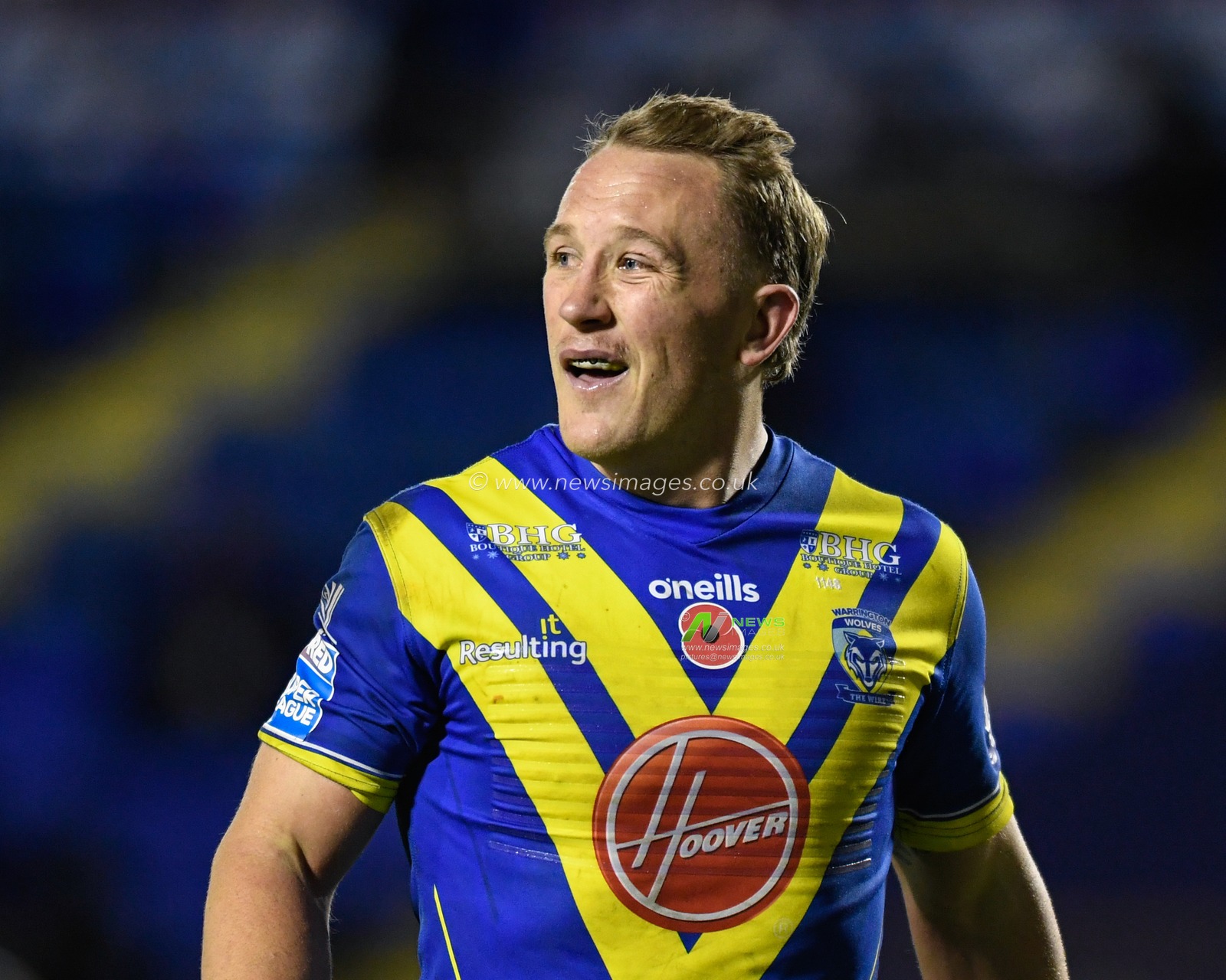 Jason Clark #14 of Warrington Wolves in action during the game