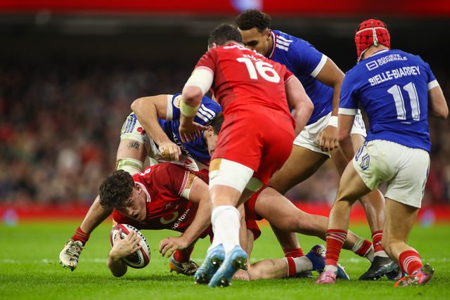 Eddie James of Wales gets tackled during the Guinness Six Nations match Wales vs France at Principality Stadium, Cardiff, United Kingdom, 15th February 2026

(Photo by Andrew Lewis/News Images)
