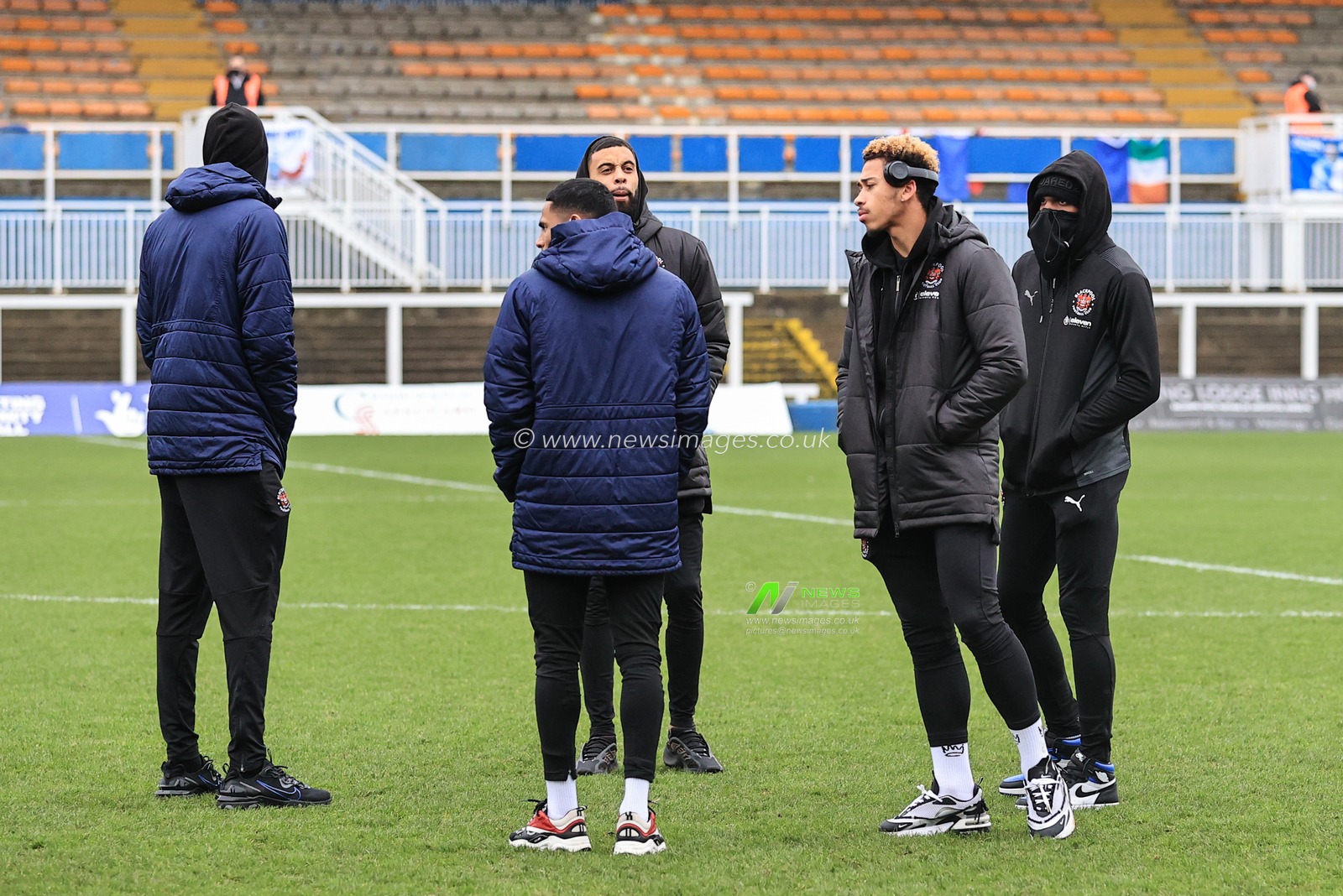 Blackpool players arrive at the Suit Direct Stadium
