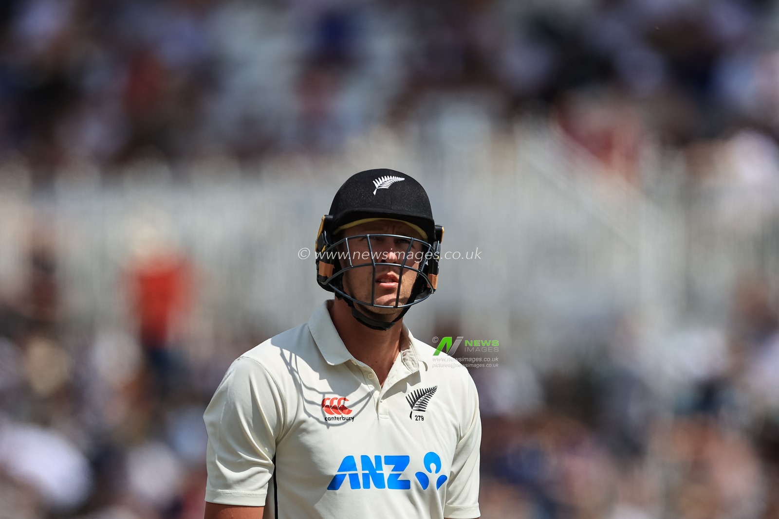 Kyle Jamieson of New Zealand leaves the field after being caught by Ben Foakes of England
