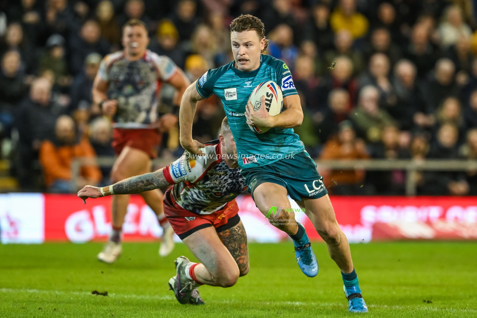 Jai Field #1 of Wigan Warriors makes a break during the Betfred Super League Round 7 match Leigh Leopards vs Wigan Warriors at Leigh Sports Village, Leigh, United Kingdom, 30th March 2023

(Photo by Craig Thomas/News Images)