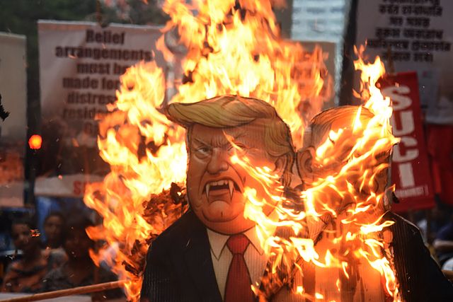 Activists of Social Unity Center of India (SUCI) hold placards and an effigy of US President Donald Trump and Israel's Prime Minister Benjamin Netanyahu during a protest against Western policy in the Israel-Hamas conflict, near US Embassy in Kolkata, Eastern India, 07 October 2025.Photo by Debajyoti Chakraborty.(Photo: Debajyoti Chakraborty/News Images)