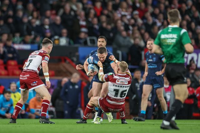 Matt Parcell of Hull KR is tackled by Luke Thompson of Wigan Warriors during the Betfred Super League Grand Final match Wigan Warriors vs Hull KR at Old Trafford, Manchester, United Kingdom, 12th October 2024

(Photo by Mark Cosgrove/News Images)