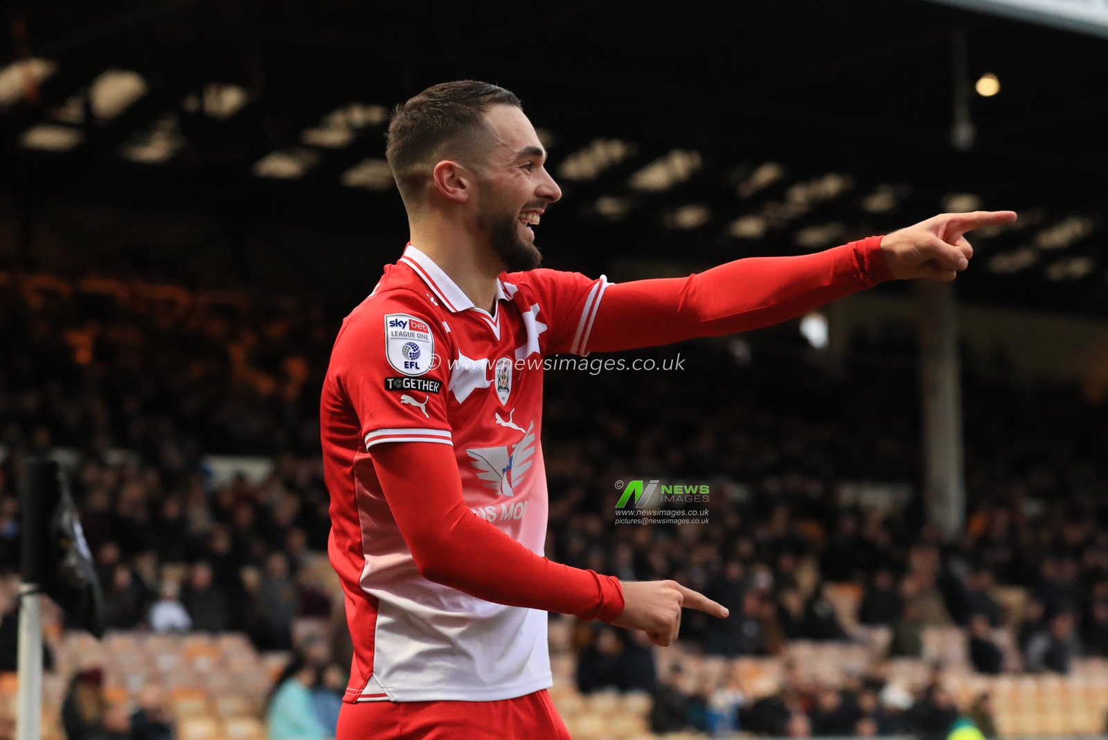 Adam Phillips #30 of Barnsley celebrates his goal to make it 0-1 during the Sky Bet League 1 match Port Vale vs Barnsley at Vale Park, Burslem, United Kingdom, 26th December 2023

(Photo by Alfie Cosgrove/News Images)