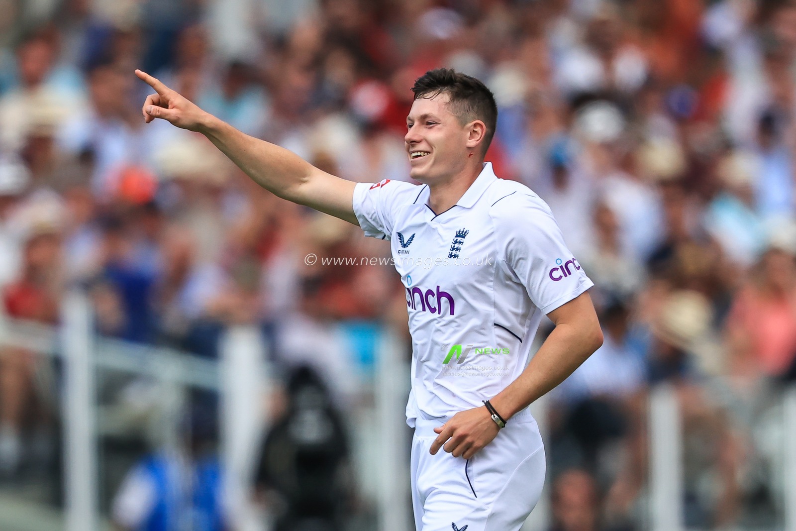 Matthew Potts of England celebrates catching Ajaz Patel of New Zealand LBW