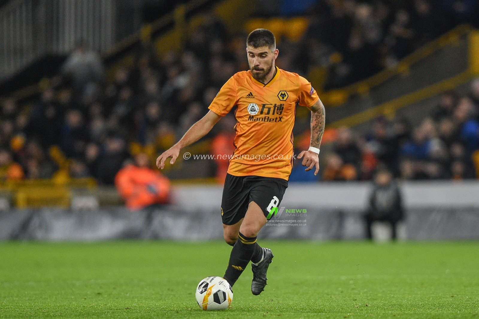12th December 2019, Molineux, Wolverhampton, England; UEFA Europa League, Wolverhampton Wanderers v Besiktas : Ruben Neves (8) of Wolverhampton Wanderers with the ball 

Credit: Richard Long/News Images