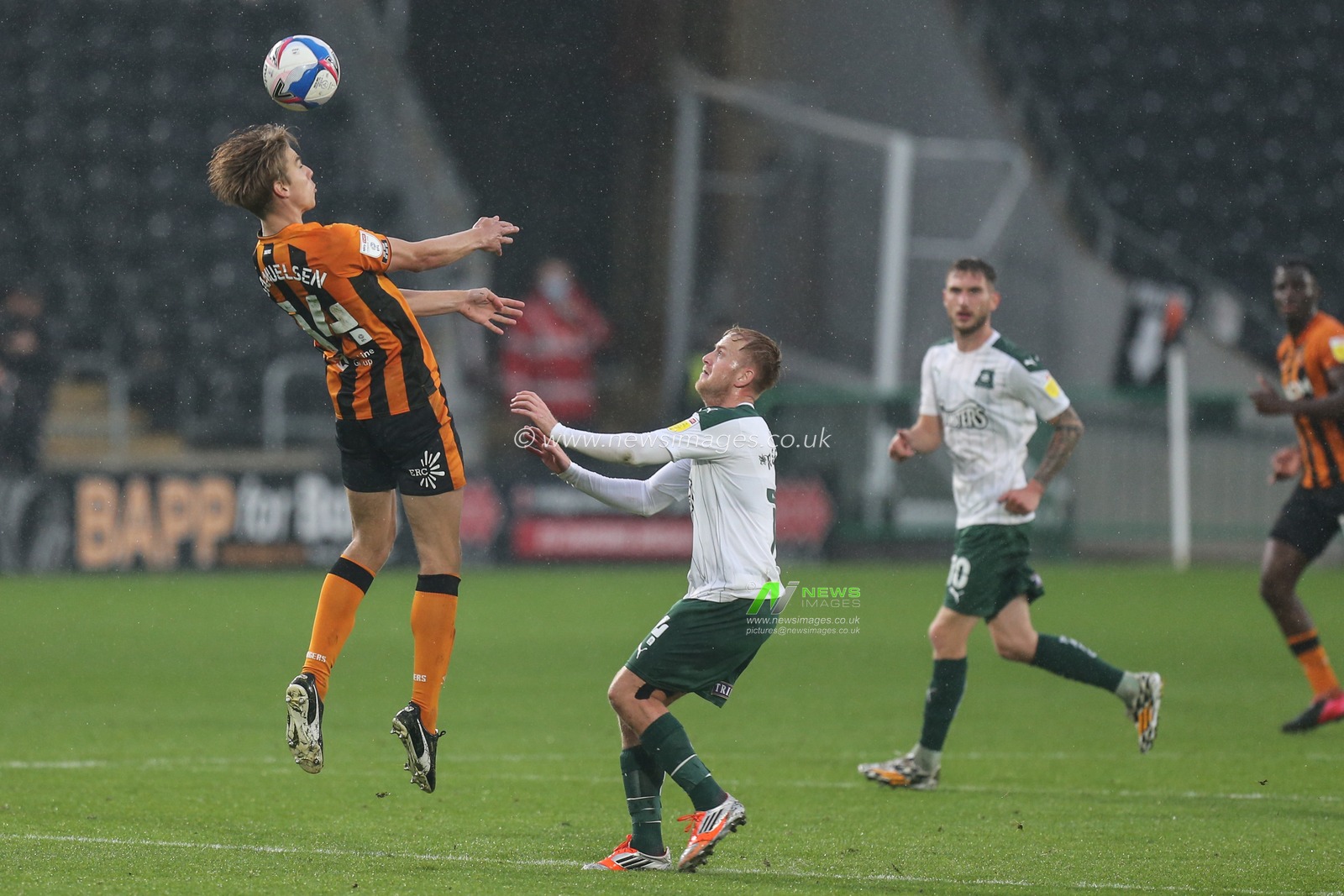 Martin Samuelsen (14) of Hull City goes up for the header