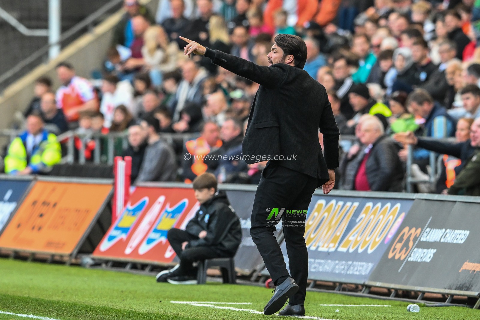 Russell Martin Manager of Swansea City gives his team instructions during the Sky Bet Championship match Swansea City vs Huddersfield Town at Swansea.com Stadium, Swansea, United Kingdom, 15th April 2023

(Photo by Craig Thomas/News Images)