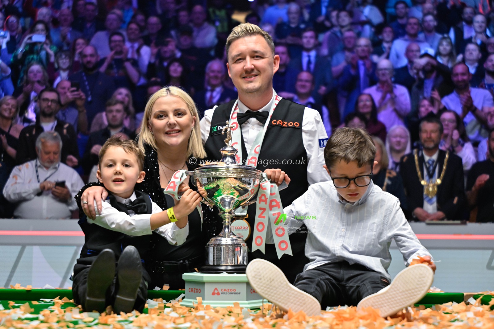 Kyren Wilson celebrates the Cazoo World Championships victory with his family following the Cazoo World Championships 2024 Final at Crucible Theatre, Sheffield, United Kingdom, 6th May 2024

(Photo by Cody Froggatt/News Images)