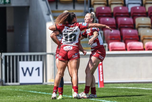 Anna Davies of Wigan Warriors celebrates her try during the Betfred Women's Challenge Cup Cup Semi-final match Leeds Rhinos vs Wigan Warriors at LNER Community Stadium, York, United Kingdom, 10th May 2025

(Photo by Alfie Cosgrove/News Images)