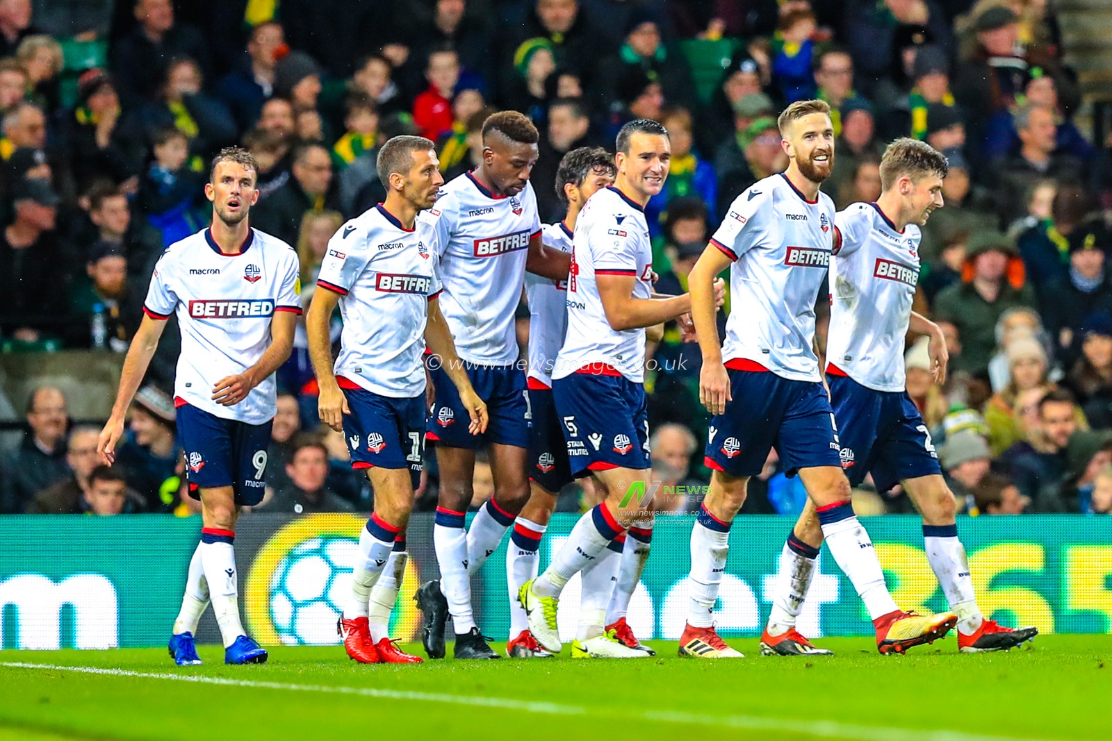 8th December 2018, Carrow Road, Norfolk, England; Sky Bet Championship, Norwich City v Bolton Wonderers ;  Bolton Wonderers celebrate Mark Beevers' goal to level the scores at 2-2.

Credit: Georgie Kerr/News Images

English Football League images are subject to DataCo Licence