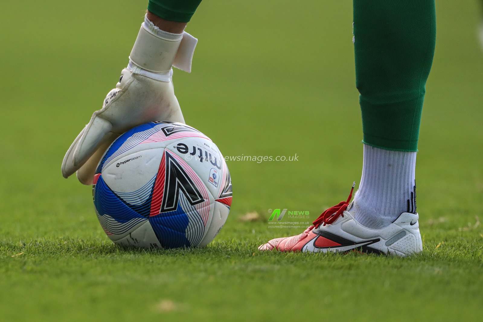 Ben Foster (1) of Watford  picks up todays Sky Bet EFL Mitre Delta Max match ball