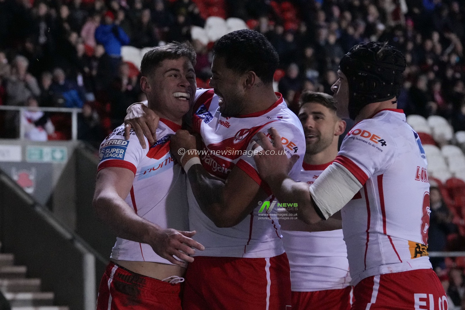 Waqa Blake of St. Helens celebrates with try scorer Jack Welsby of St. Helens  during the Betfred Super League Round 4 match St Helens vs Salford Red Devils at Totally Wicked Stadium, St Helens, United Kingdom, 8th March 2024

(Photo by Steve Flynn/News Images)