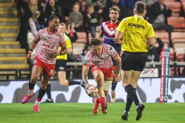 Keanan Brand of Leigh Leopards goes over for a try to make it 4-0 during the Betfred Super League play-off Eliminator 1 match Leigh Leopards vs Wakefield Trinity at Progress With Unity Stadium, Leigh, United Kingdom, 26th September 2025

(Photo by Alfie Cosgrove/News Images)