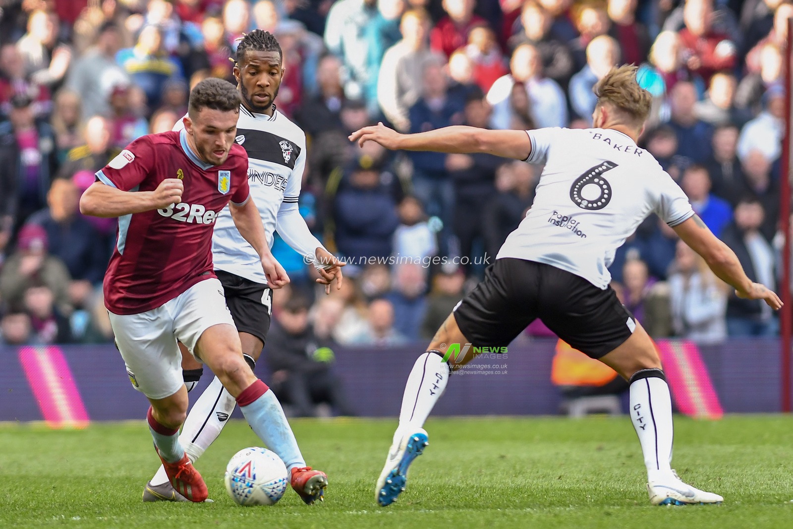 13th April 2019, Villa Park, Birmingham, England ; Sky Bet Championship, Aston Villa vs Bristol City : John McGinn (07) of Aston Villa skips past Nathan Baker (06) of Bristol City

Credit: Gareth Dalley/News Images

English Football League images are subject to DataCo Licence